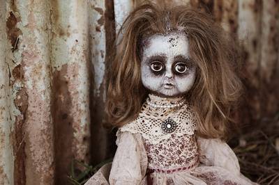Antichrist signs: Scary horror creepy doll
